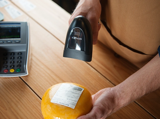 Cheese specialty store with Opticon L-50 Handheld 2D barcode Scanner